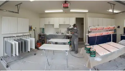 Professional cabinet painting in Kissimmee FL using spray and brush techniques for smooth, durable finishes