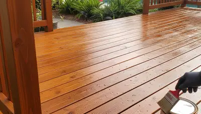 Professional deck staining in Kissimmee FL enhancing wood color and protecting outdoor decks from sun and moisture