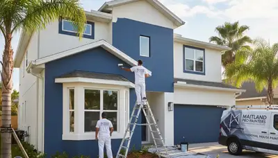 Professional house painters working on residential exterior in Kissimmee FL