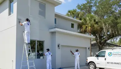 Professional house painters in Kissimmee FL transforming home exterior with fresh paint finish