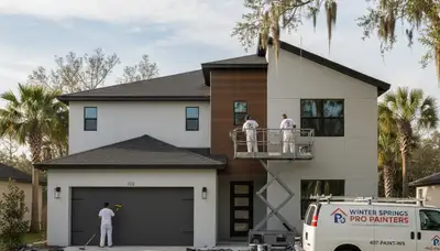 Professional house painters improving home exterior finish in Kissimmee, FL