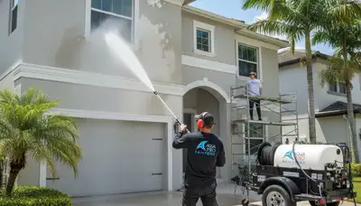 Professional pressure cleaning on Florida home exterior by house painters in Kissimmee, FL